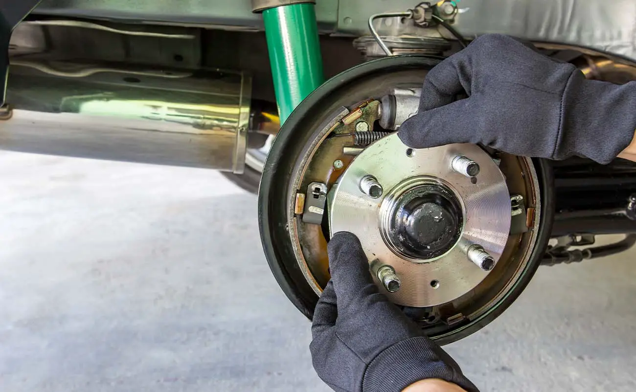 mechanic installing new wheel bearings