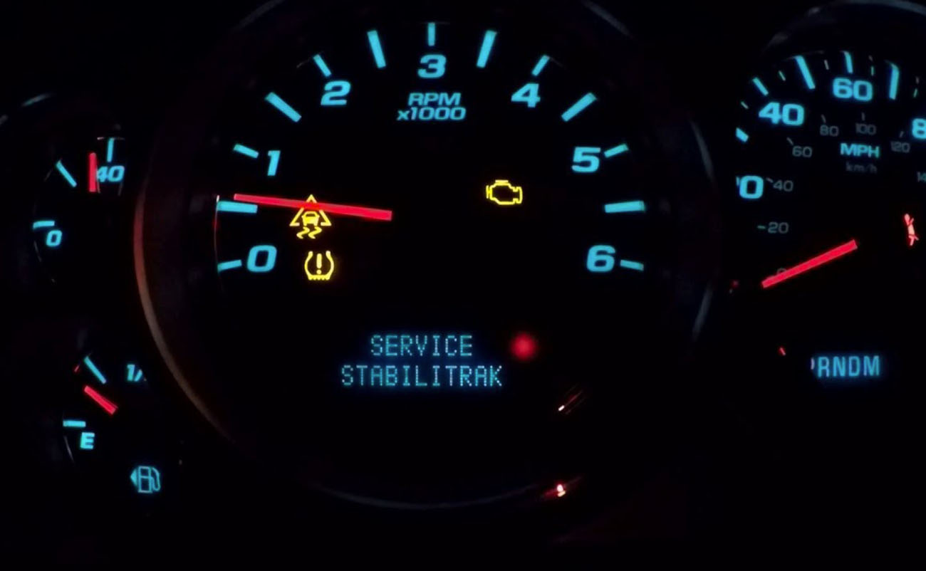 illuminated service stabilitrak message on car dashboard